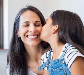 a mother and daughter to represent healthy ways to combat mom guilt