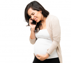 A pregnant woman on the phone experiencing labor precautions