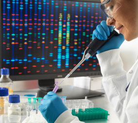a scientist in a lab working on cell-free dna genetic testing
