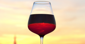 A glass of red wine to symbolize alcohol in pregnancy and alcohol's role in breastfeeding