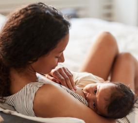 A woman breastfeeding her child