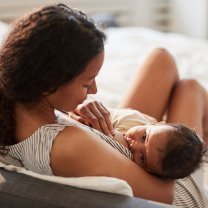 A woman breastfeeding her child