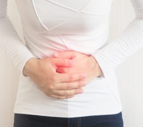 pelvic pain in a woman with isolate on white background