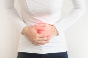 pelvic pain in a woman with isolate on white background