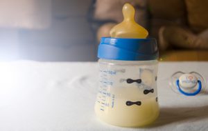 breast milk in a bottle to represent Antenatal colostrum collection