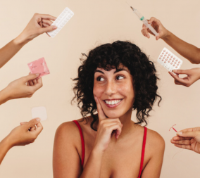 A woman being offered a variety of new contraceptives